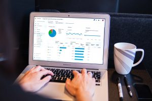 laptop screen of google analytics data charts